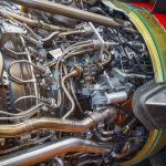 What is the main difference between a helicopter and an aircraft engine